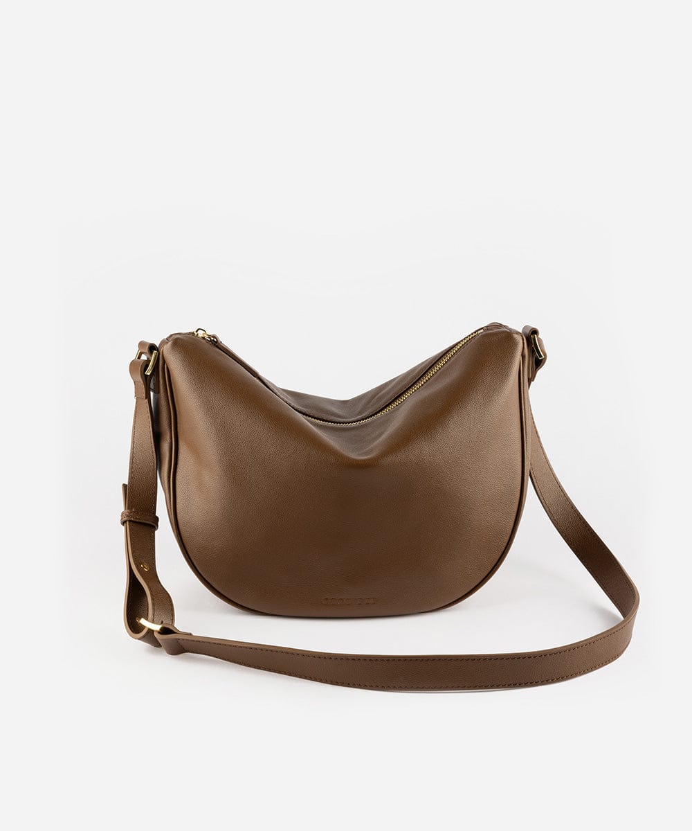 A chocolate colored genuine leather slouchy bag with a shoulder strap and zipper closure. #color_chocolate