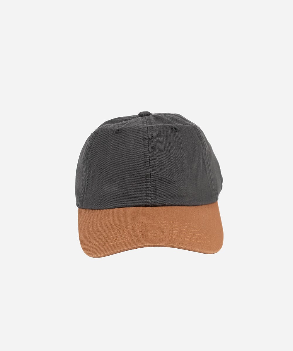 A dark grey and caramel colored ball cap on a plain background #color_dark grey-caramel