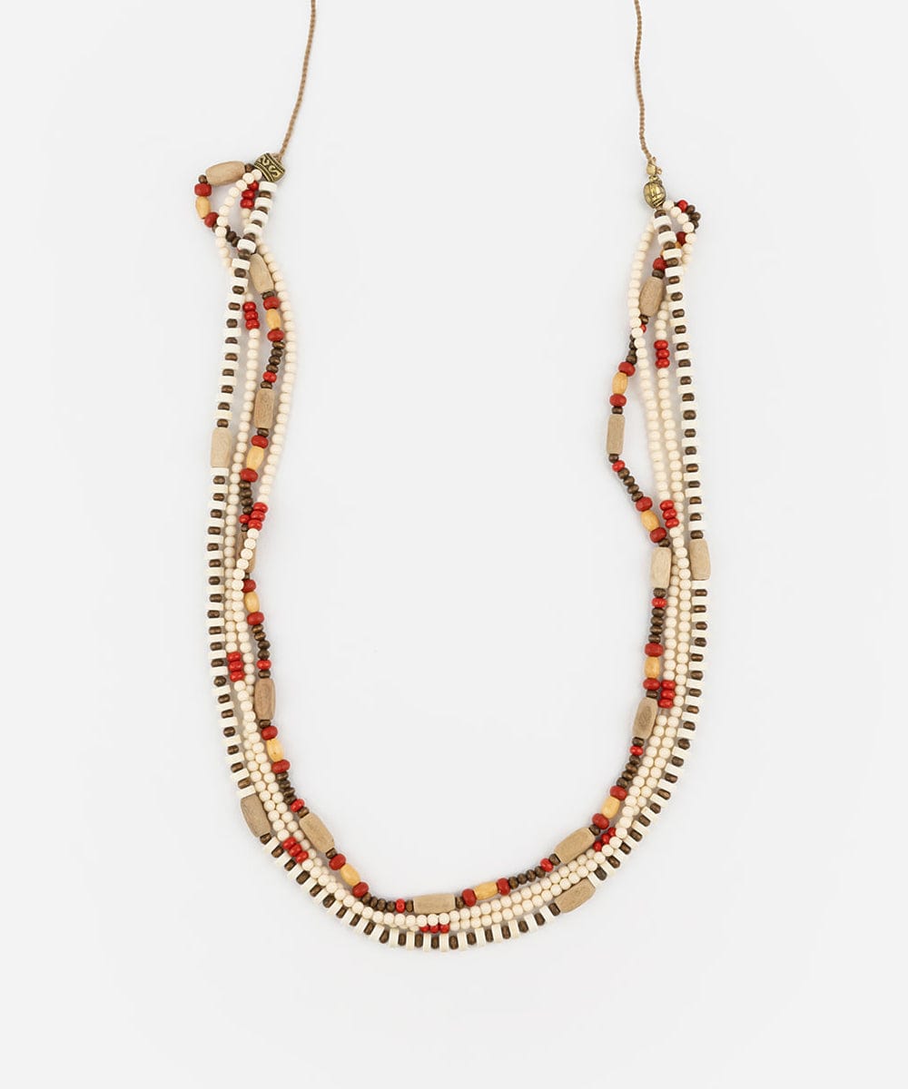 A natural colored layered beaded hat band on a plain background #color_natural