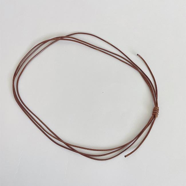 A brown triple strand hat band on a plain background #color_brown