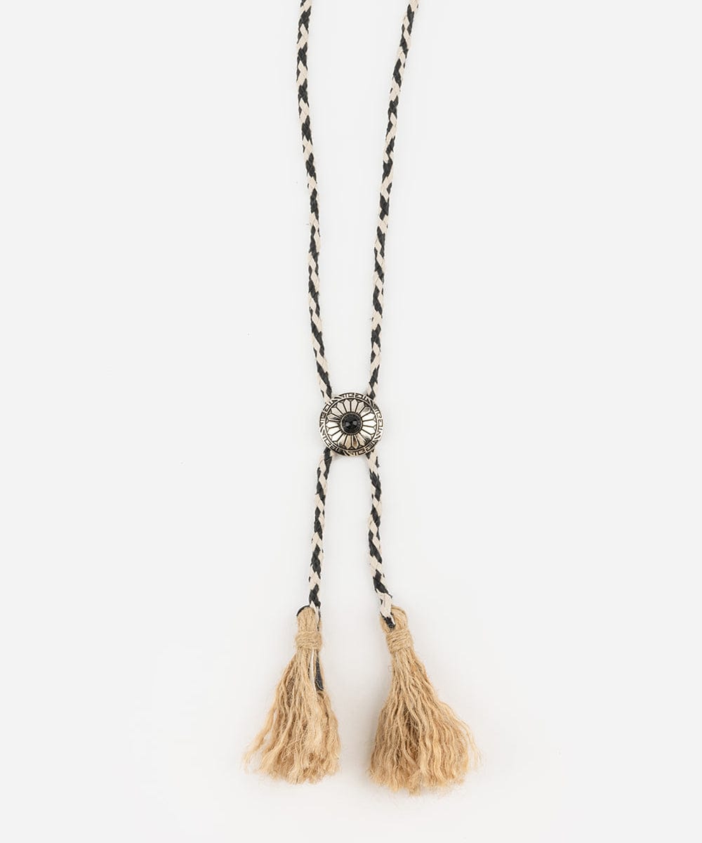 A black and white colored braided bolo tassel hat band on a plain background #color_white-black