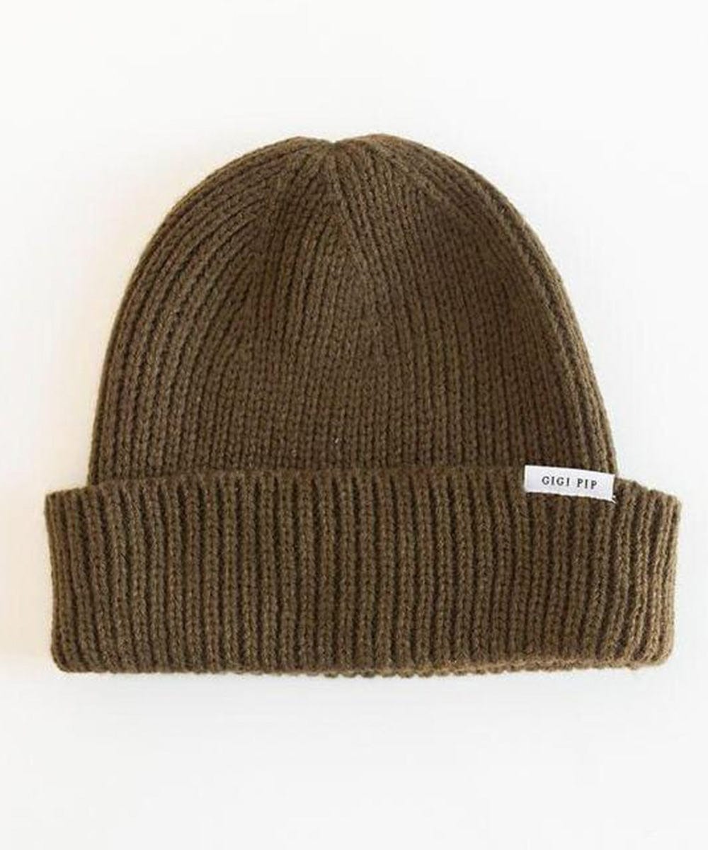 An olive colored knit beanie with the brand label on a white background #color_olive