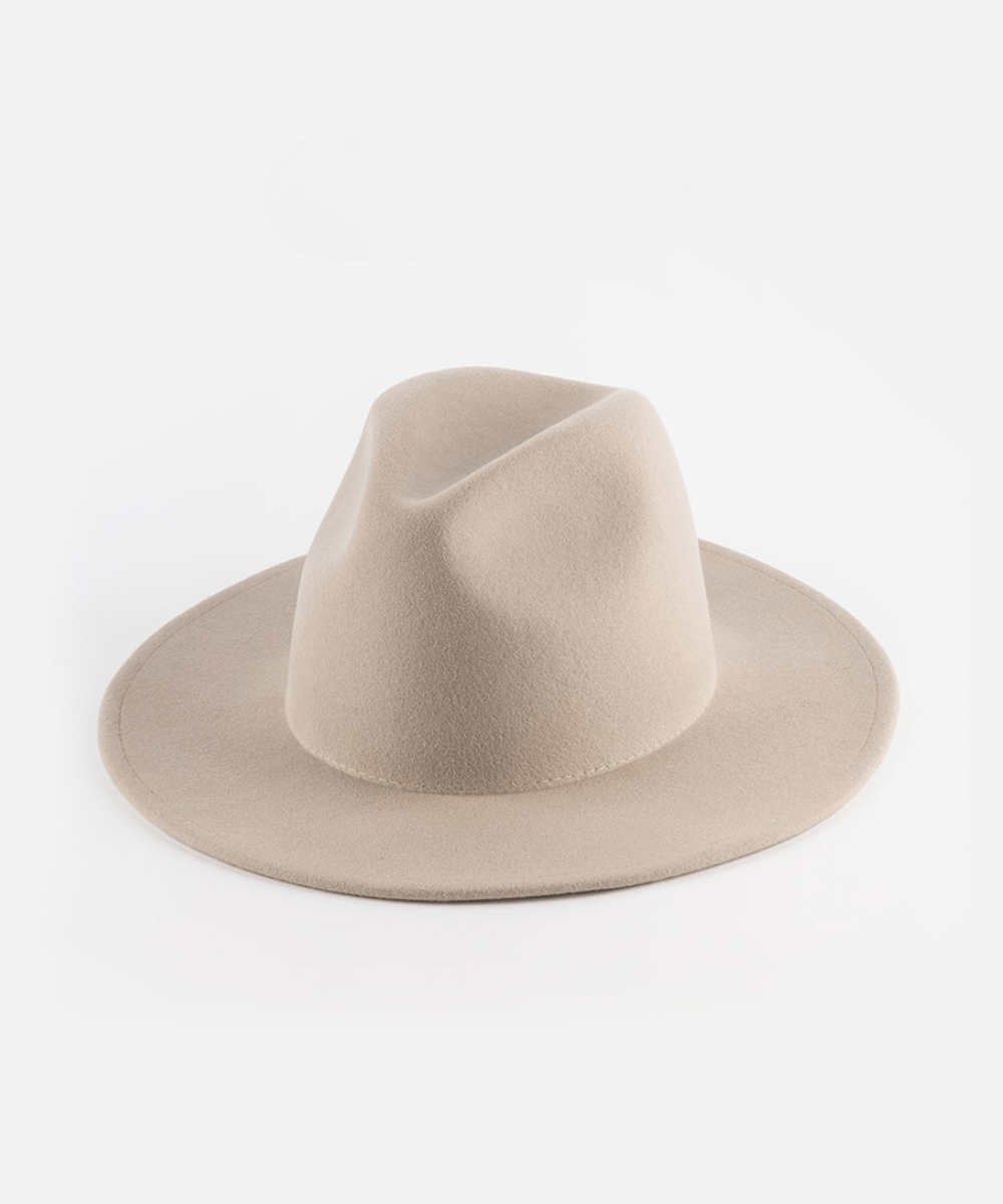 An ivory colored fedora hat on a plain background #color_ivory