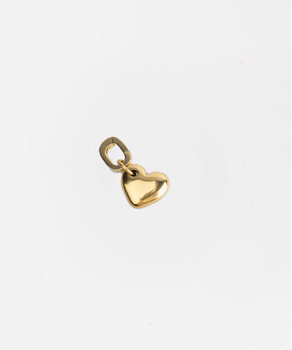 Gold heart-shaped pendant hat charm on a white background #color_gold