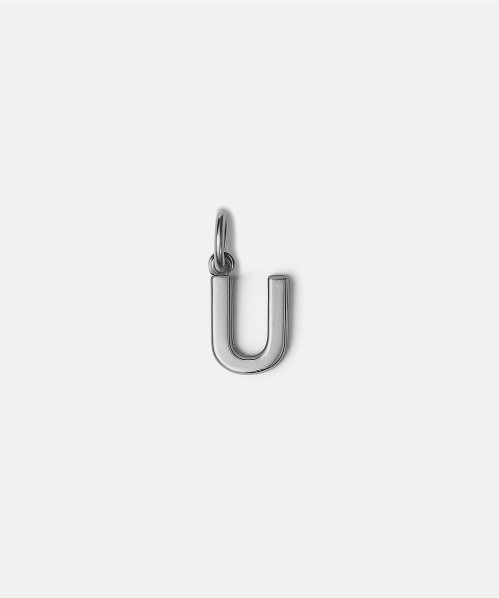 Silver letter 'U' hat charm on a white background #color_silver