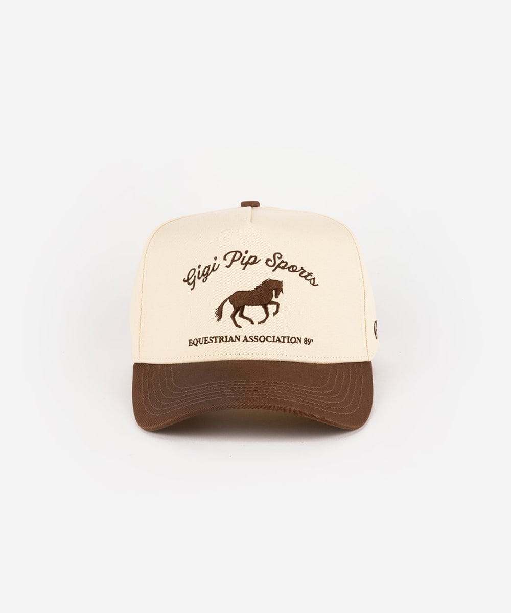 Beige and brown cap with 'Gigi Pip Sports' logo on a white background #color_cream - chocolate brown