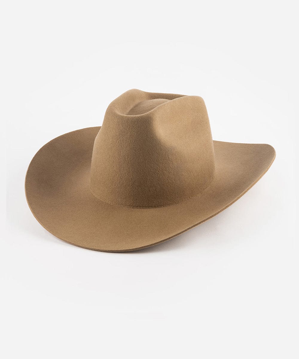 A brown cowboy hat with a stiff, traditional wide western brim and a brick top style crown. #color_brown