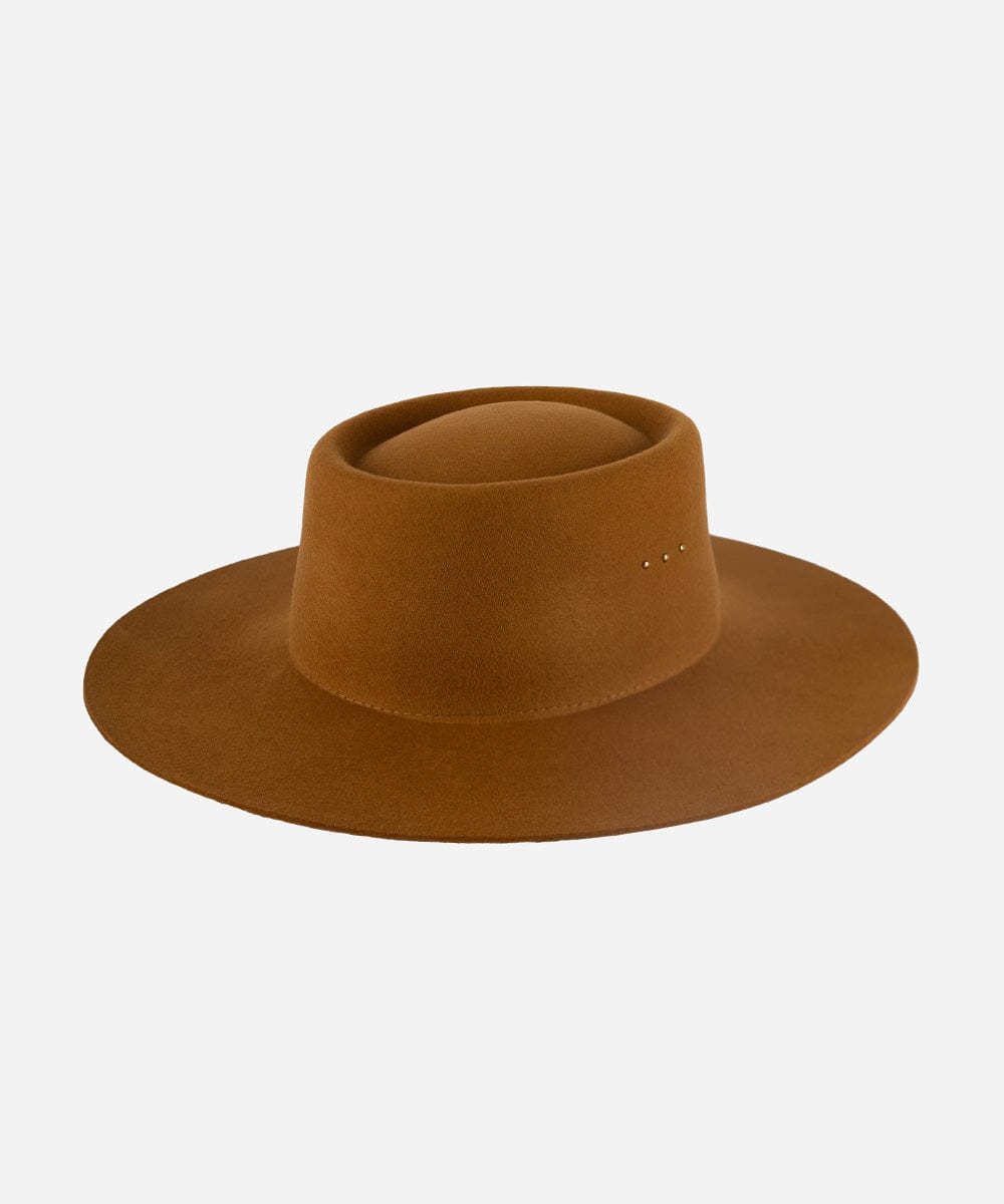 A cinnamon colored boater hat with a minimalistic design and three gold plated studs on the crown. #color_cinnamon