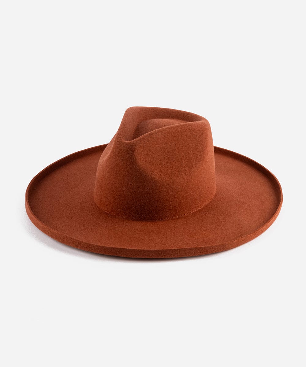 A clay colored pencil brim fedora hat with a wide brim, displayed on a plain background. #color_clay