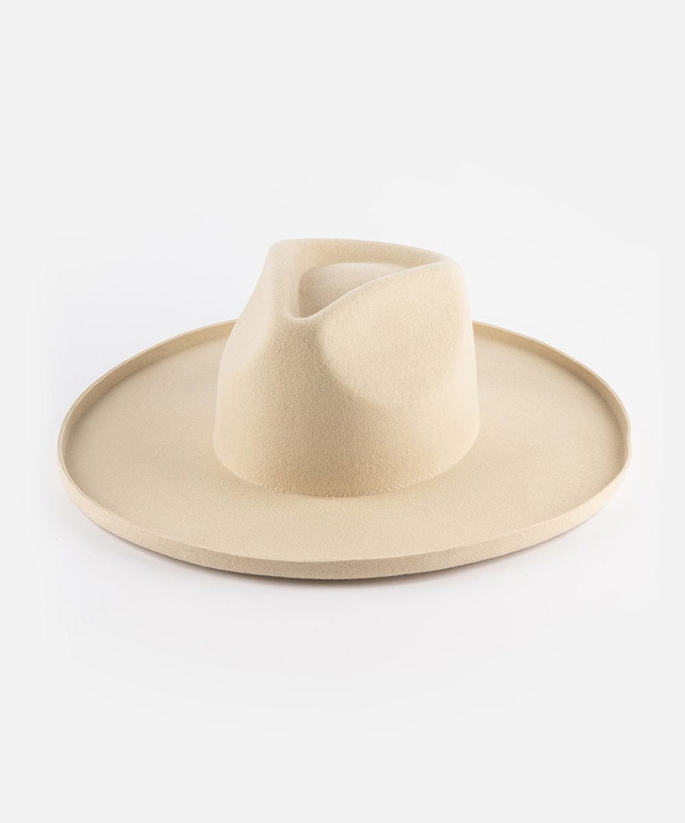 A cream colored pencil brim fedora hat with a wide brim, displayed on a plain background. #color_cream