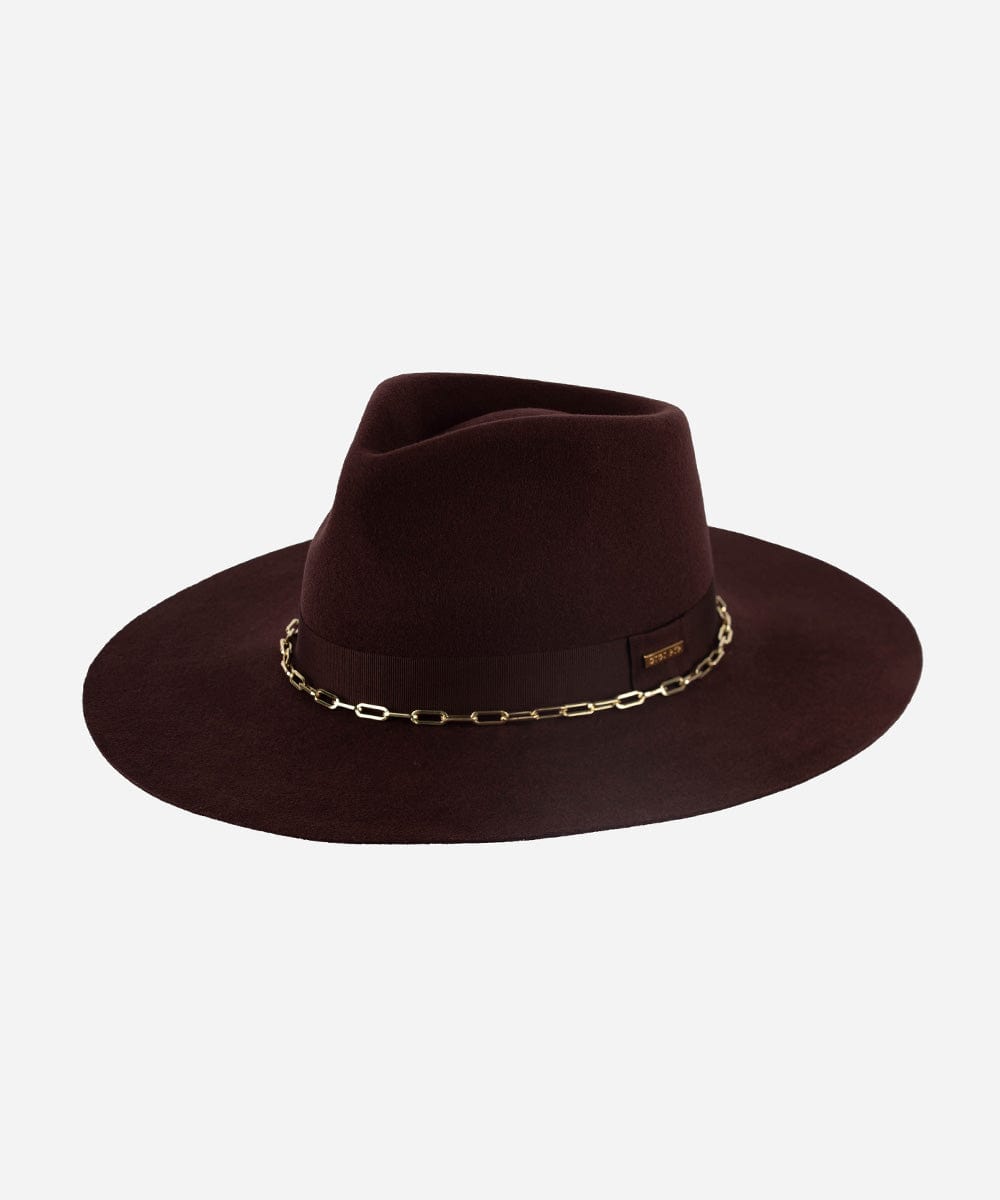 A dark cherry colored wide brim fedora hat with a gold chain detail around the base of the crown on a plain background. #color_dark cherry