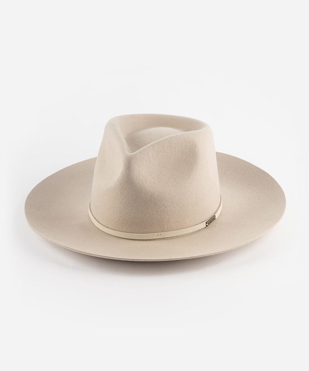 An ivory colored Rowan Wide Brim Fedora hat with an attached leather band on a white background. #color_ivory