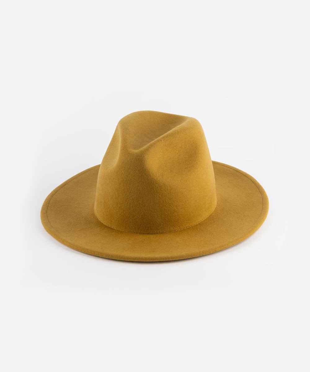A mustard colored fedora hat on a white background #color_mustard