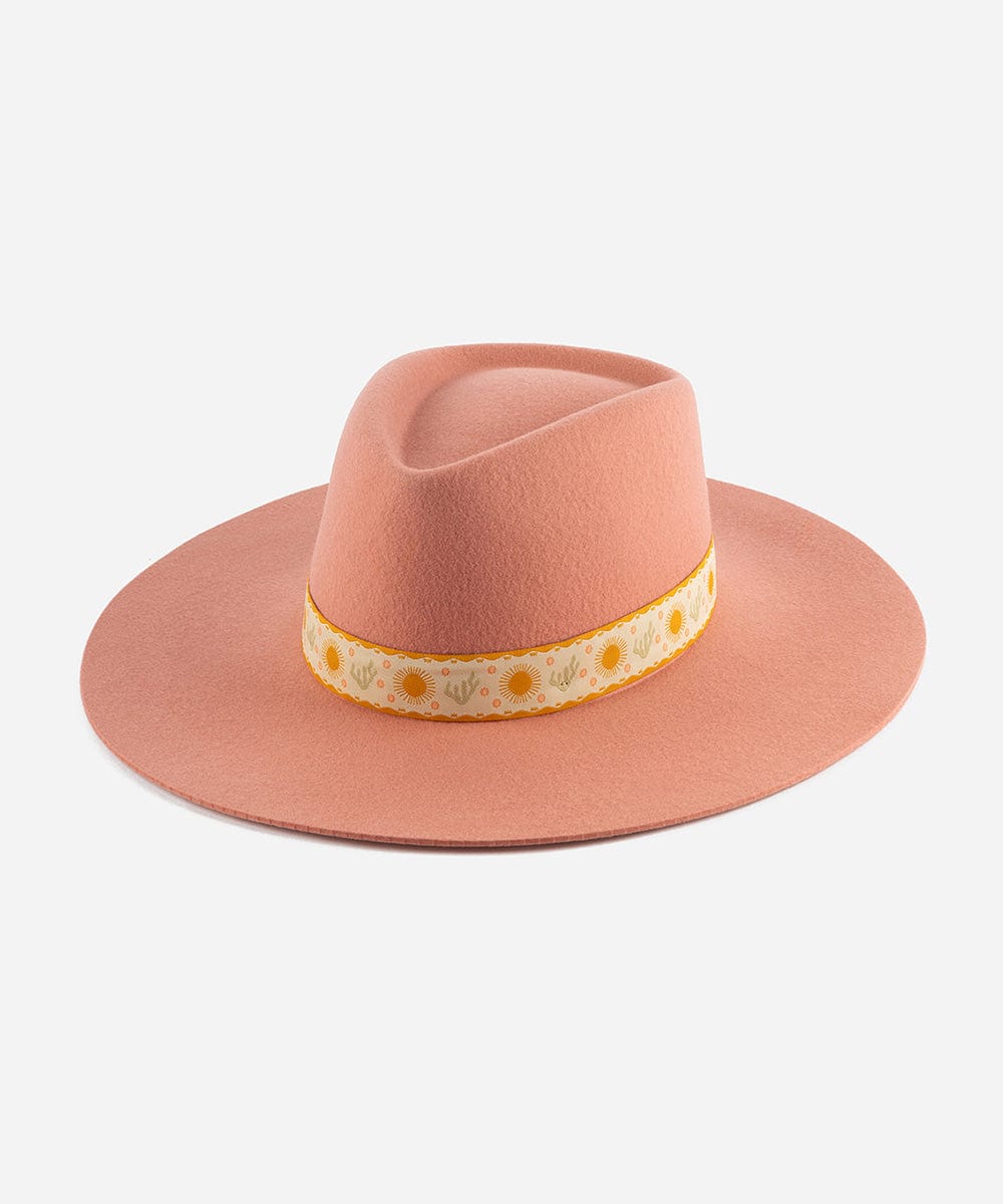 A pink Dakota Dae Triangle Crown hat with a detailed band on a plain background #color_pink