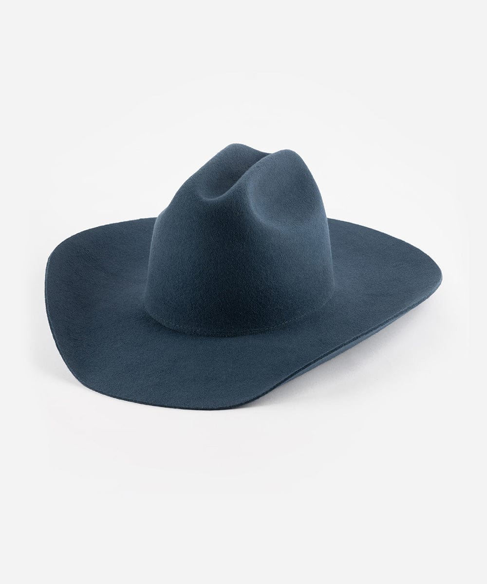 A navy blue Teddy Cattleman cowboy hat with a wide brim and a true western cattleman crown. #color_vintage blue