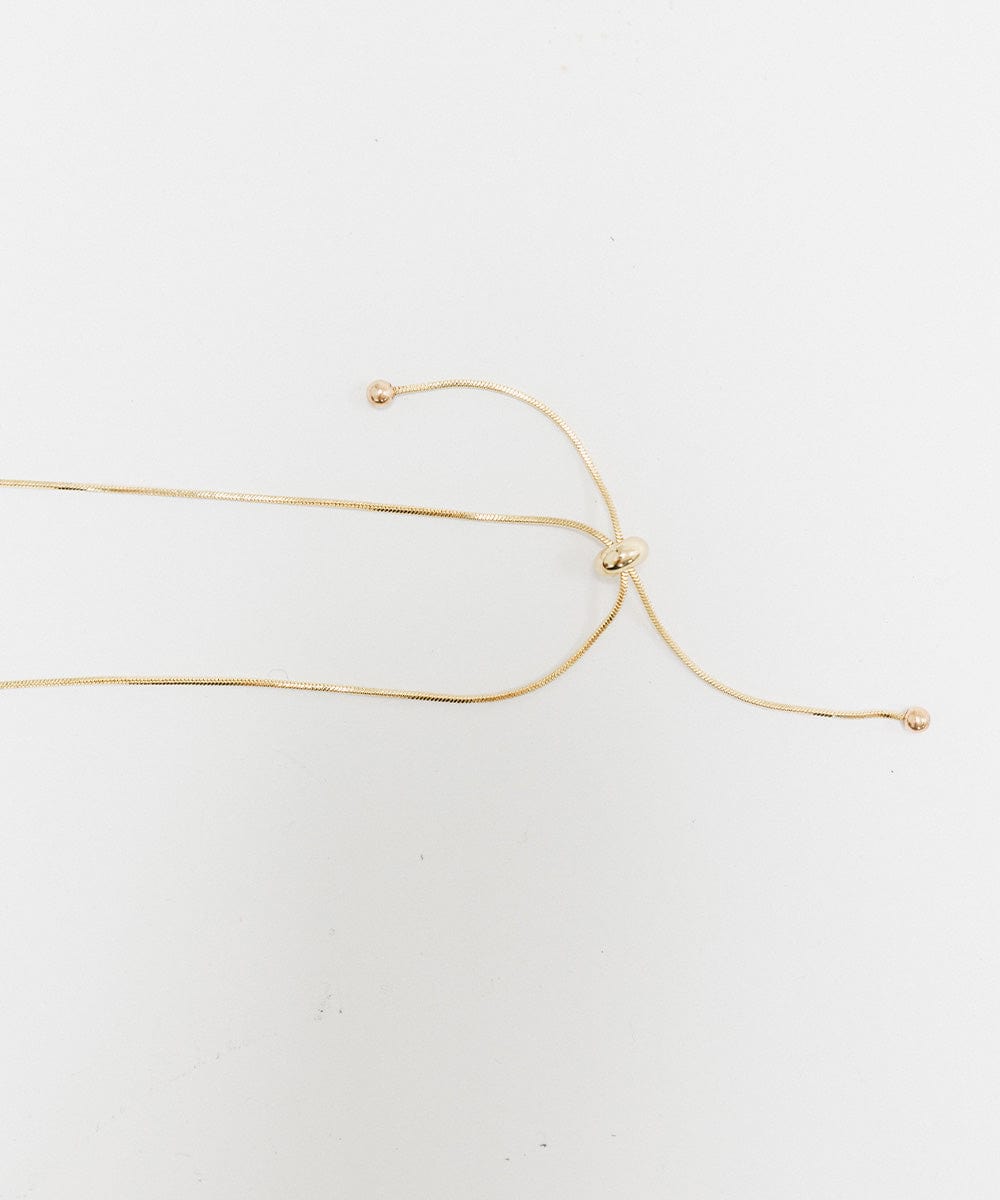 A gold Chain Bolo Hat Band on a plain background #color_gold