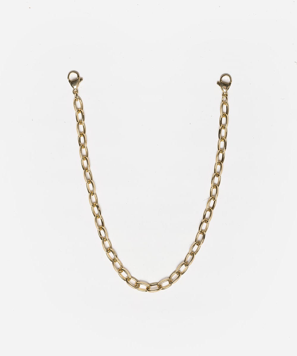 A gold trucker link chain band on a white background #color_gold