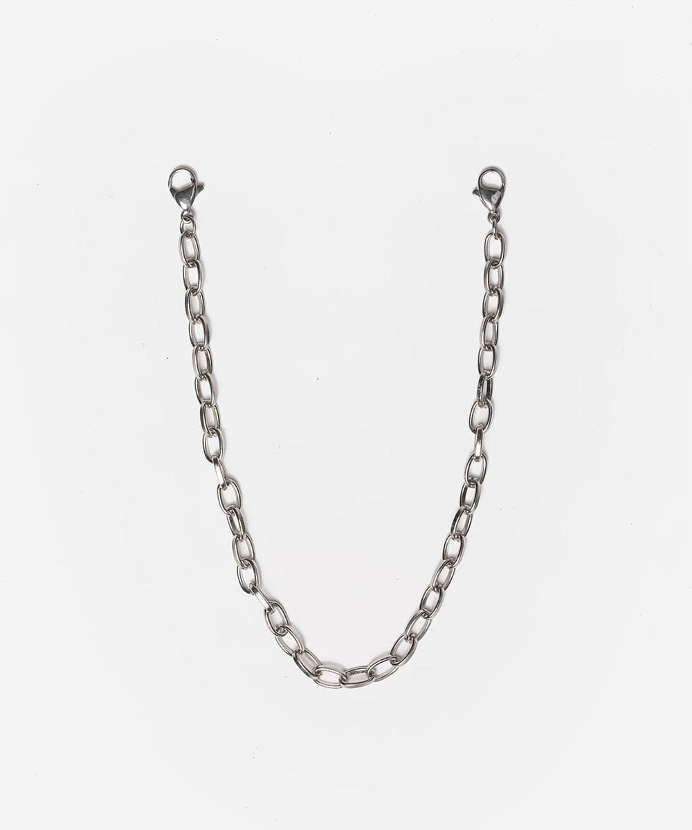 A silver trucker link chain band on a white background #color_silver