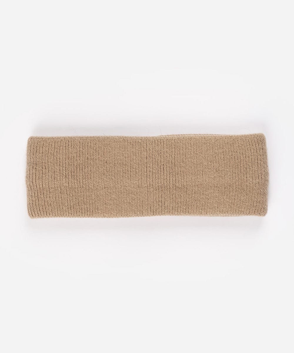 A tan headband on a plain background #color_tan