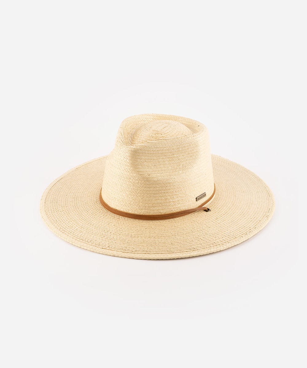 An ivory colored palm straw sun hat with a teardrop fedora crown and a wide flat brim, featuring a brown genuine leather chinstrap. #color_ivory