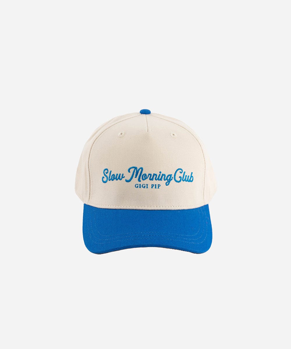 A cream and blue cap with 'Slow Morning Club' text on a white background #color_cream - blue