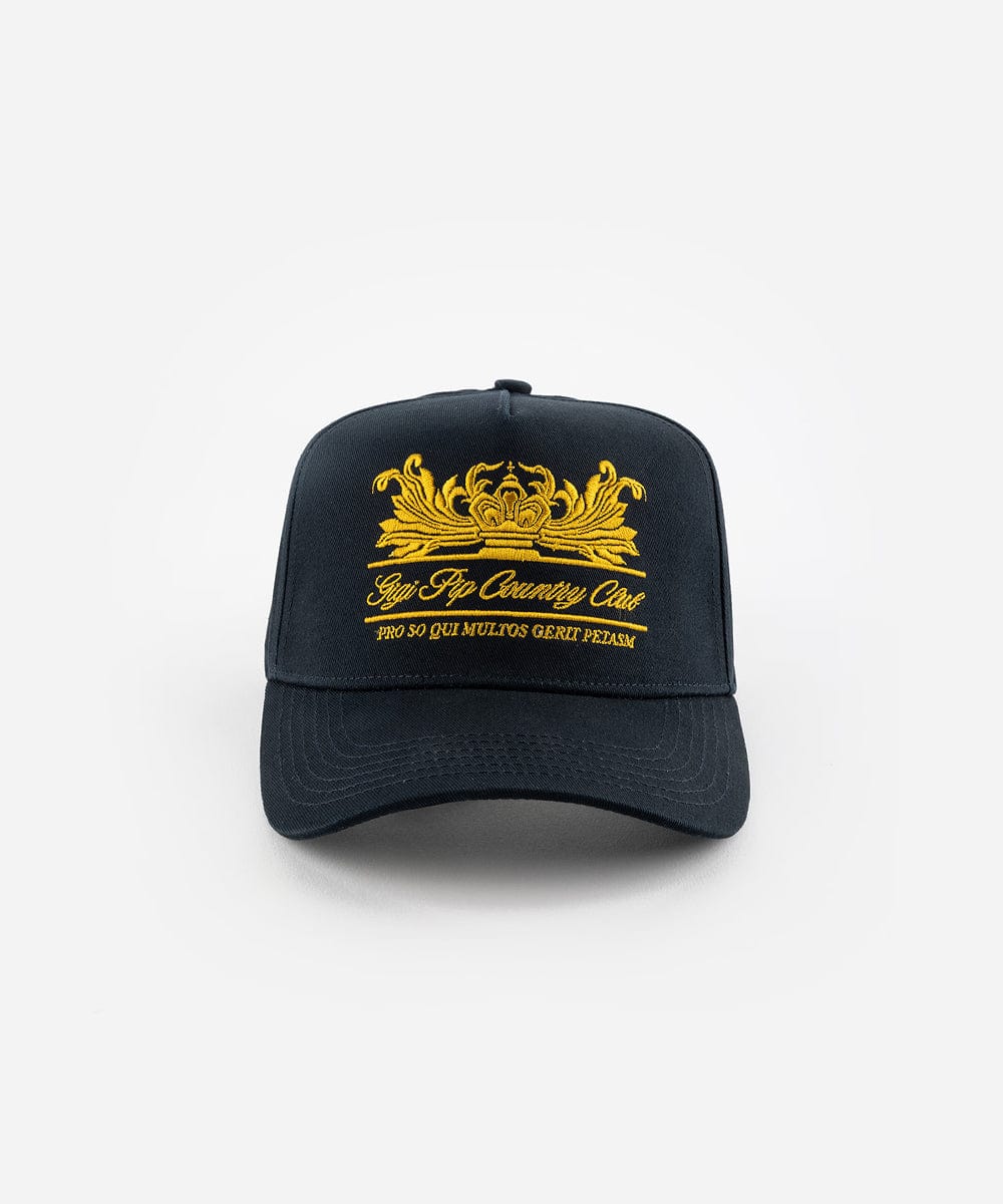 A navy vintage trucker cap with a gold logo and the text 'Gigi Pip Country Club', displayed against a plain background #color_navy