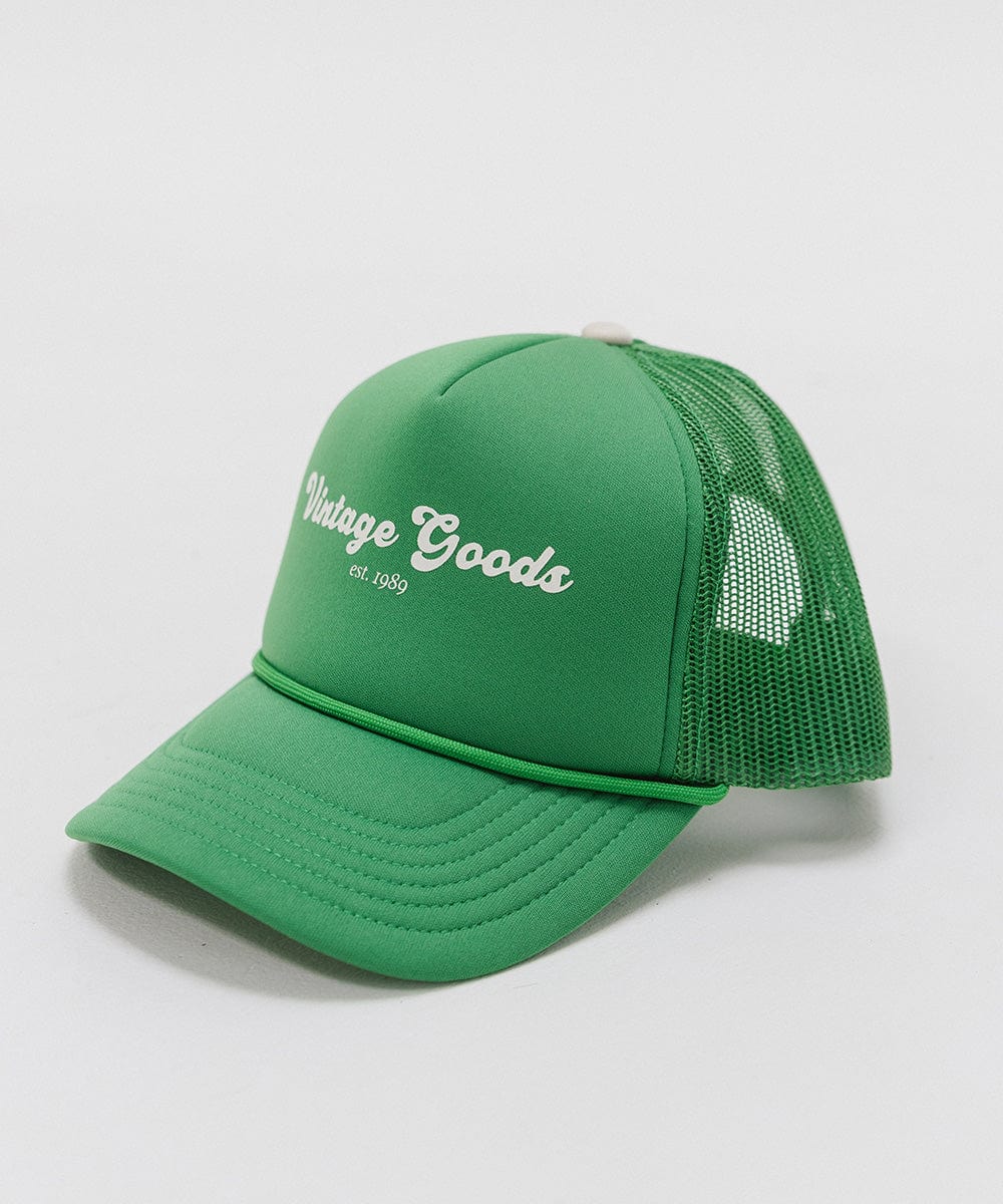 A vintage green colored trucker hat with 'Vintage Goods' text on a white background #color_vintage green
