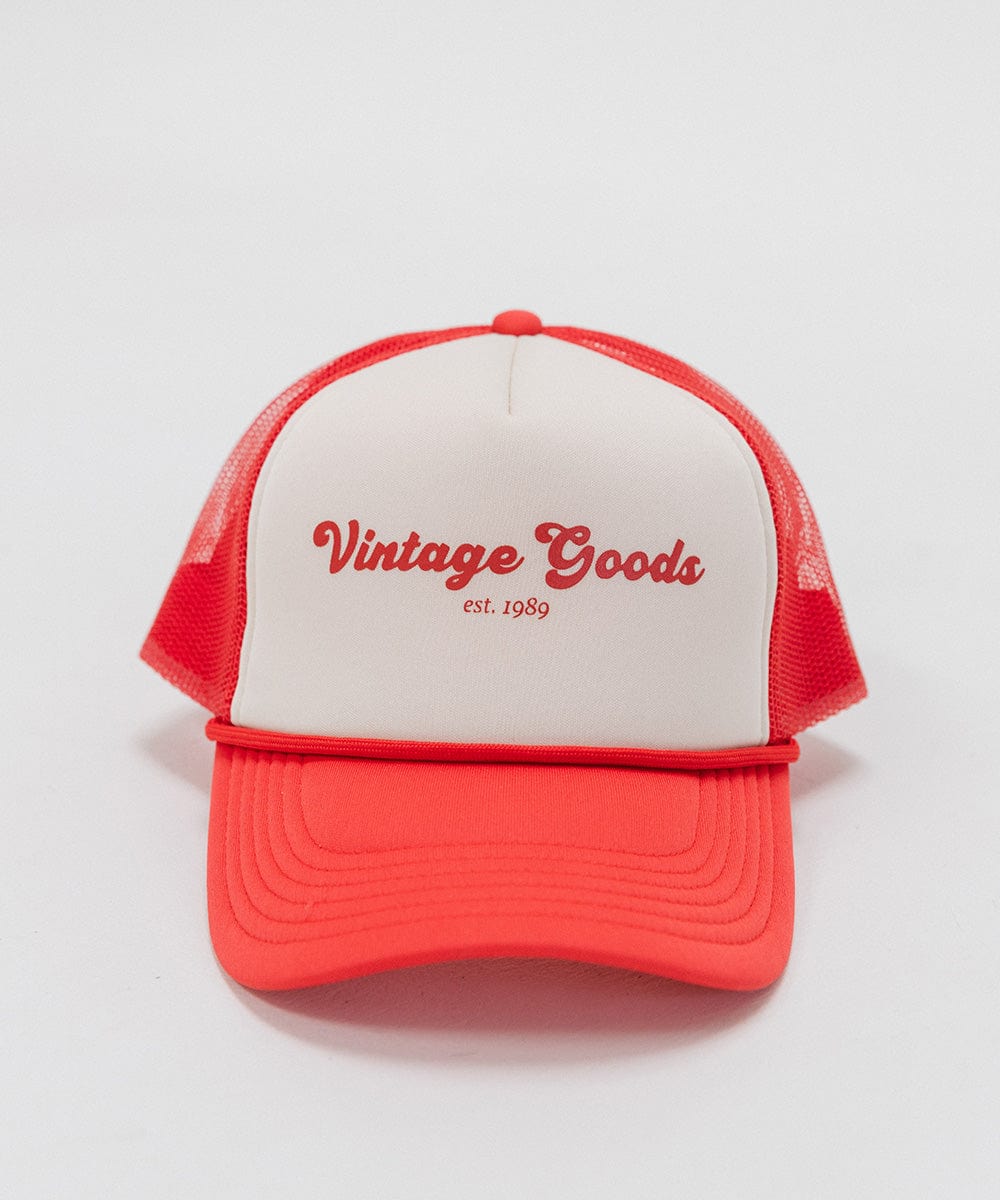 A cream and vintage red colored trucker hat with 'Vintage Goods' text on a white background #color_cream-vintage red