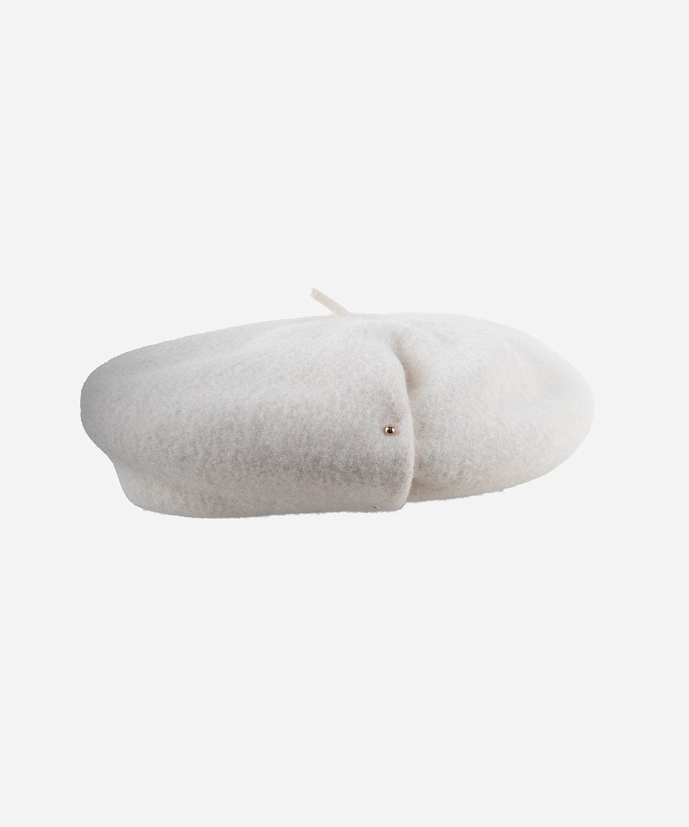 An off white beret on a white background #color_off white