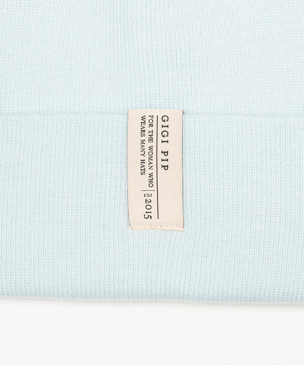 Light blue fabric with a beige label displaying 'GIGI PIP' branding. #color_sky blue