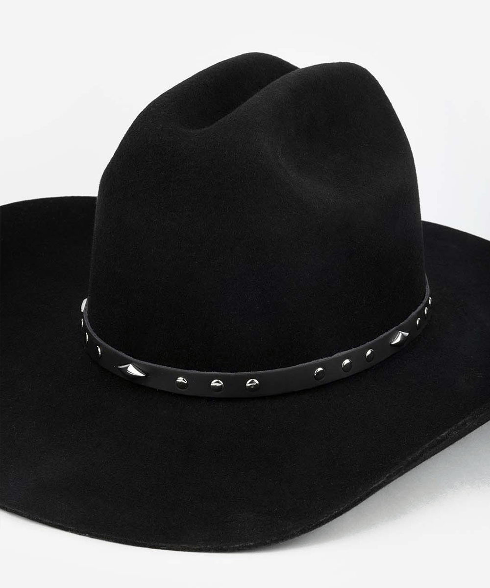 Black hat with a black studded leather hat band against a plain background #color_black