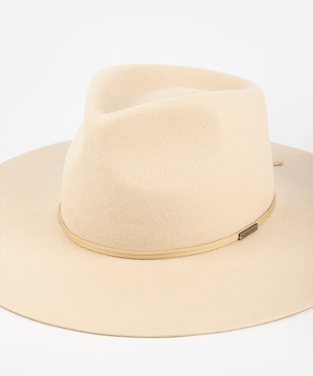 Pink cowboy hat with a nude grosgrain band on a white background #color_nude