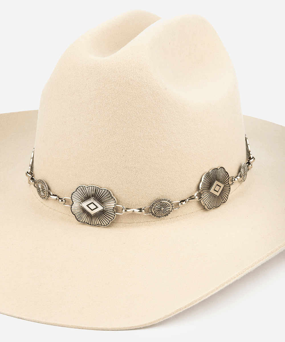Cream hat with a silver western concho band against a plain background #color_silver