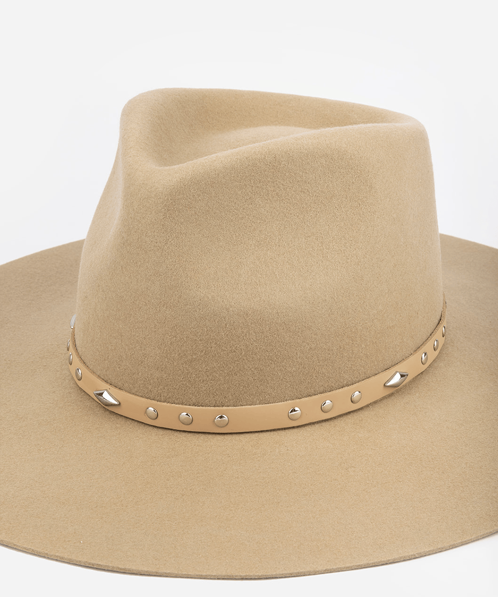 Cream hat with a tan studded leather hat band against a plain background #color_tan