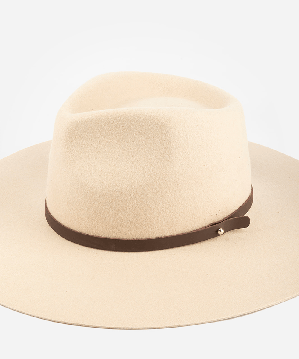 Pink cowboy hat with a chocolate colored leather band on a white background #color_chocolate