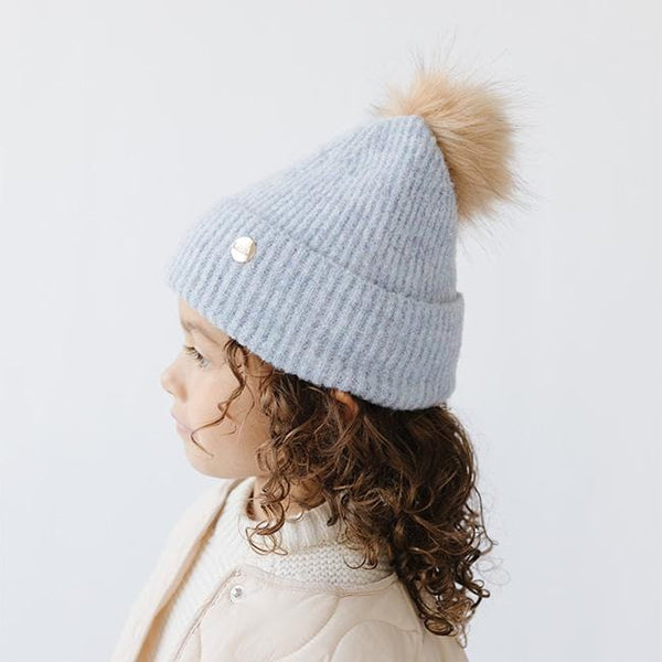 Gigi Pip beanies for kids - Milo Beanie - soft knit ribbers kid's beanie featuring a fold up brim with a rose gold Gigi Pip logo pin on the side of the fold and a pom pom on the center of the crown [periwinkle]