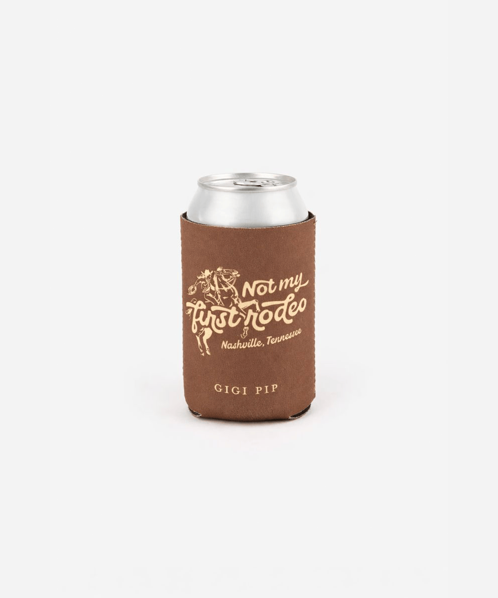 Brown can sleeve on a can with 'Not my first rodeo' text and 'GIGI PIP' branding on a white background #color_brown
