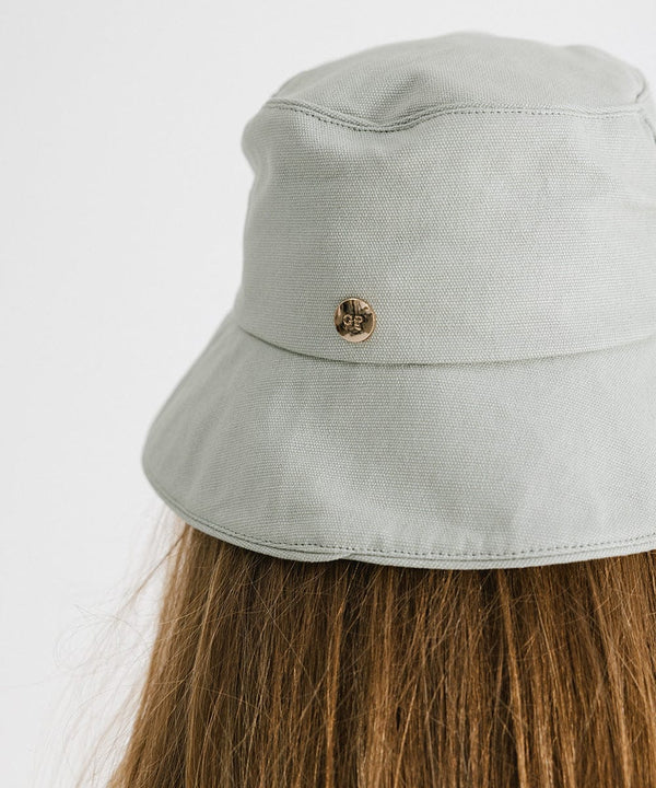 Gigi Pip bucket hats for women - Rylee Bucket Hat - 100% cotton bucket hat with a silk inner liner and an adjustable sweatband, featuring a gold Gigi Pip pin on the back of the crown [sage]