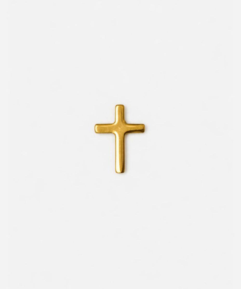 Gold cross-shaped hat pin on a white background #color_gold