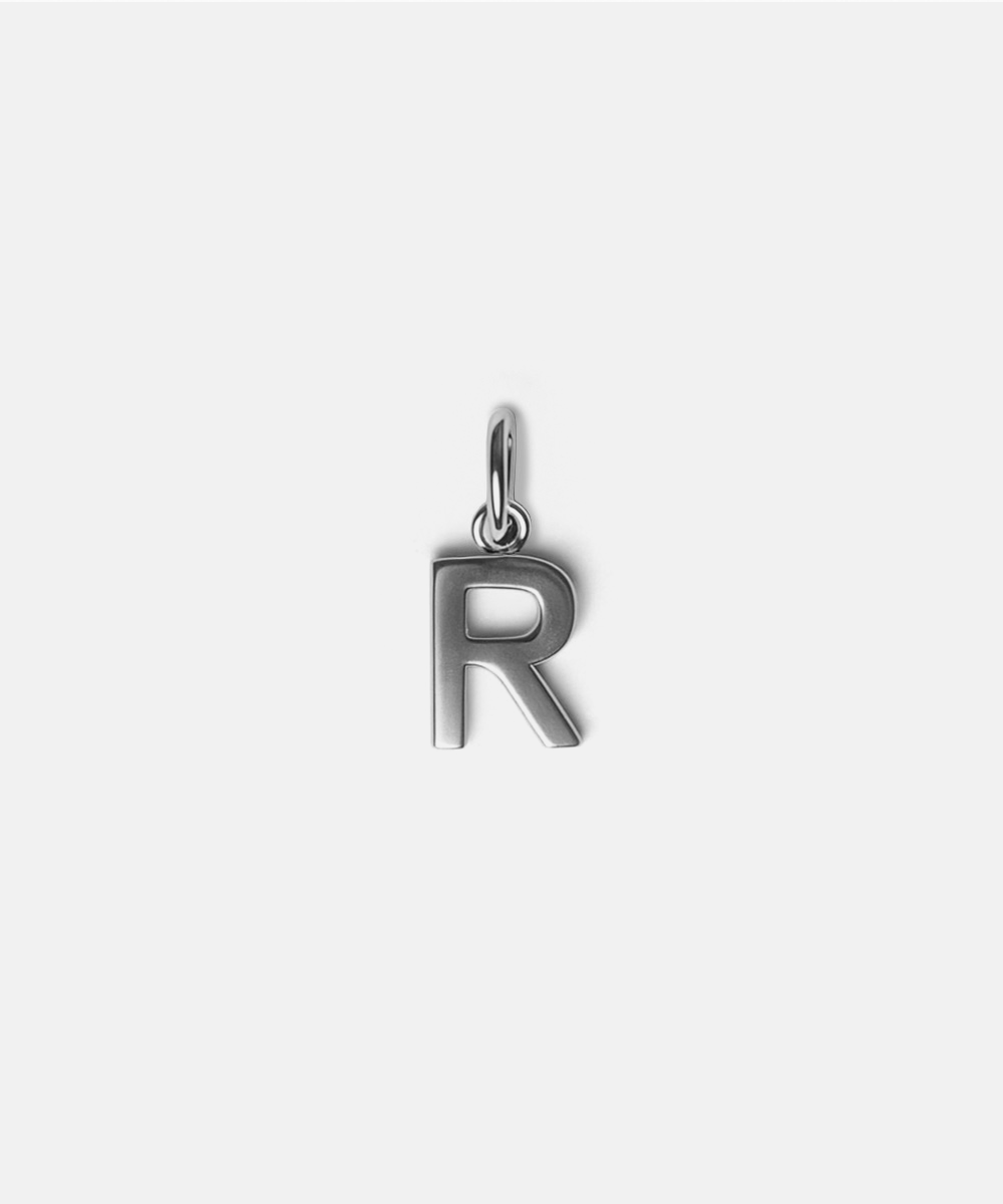 Silver letter 'R' hat charm on a white background #color_silver