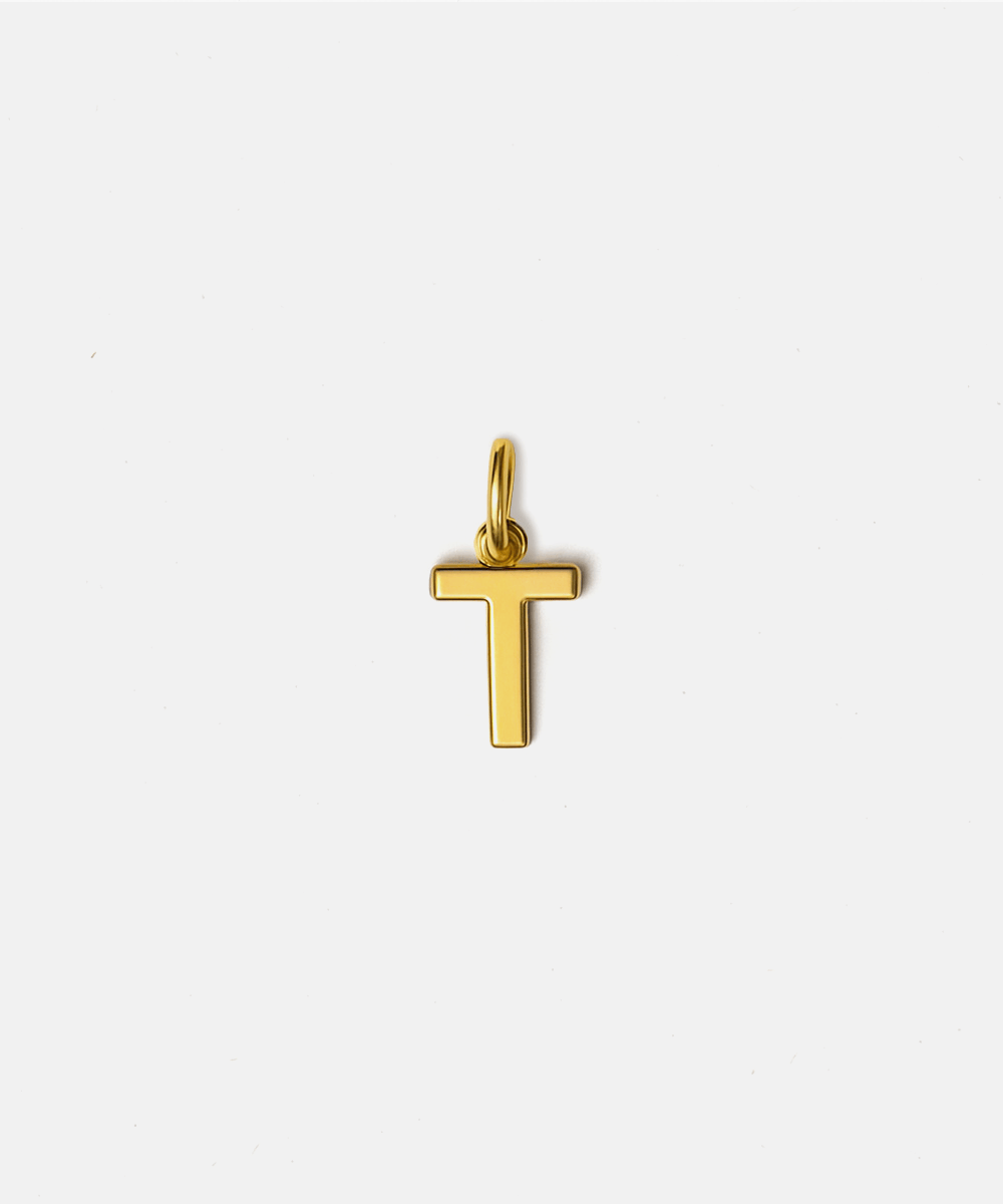 Gold letter 'T' pendant hat charm on a white background #color_gold
