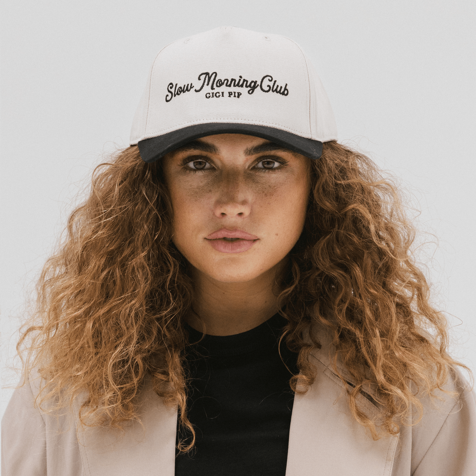 Gigi Pip trucker hats for women - Slow Morning Club Canvas Trucker Hat - 100% cotton canvas w/ cotton sweatband + reinforced from inner panel with 100% plolyester mesh trucker with Slow Morning Club embroidered on the front panel featuring an adjustable back strap [cream-black]