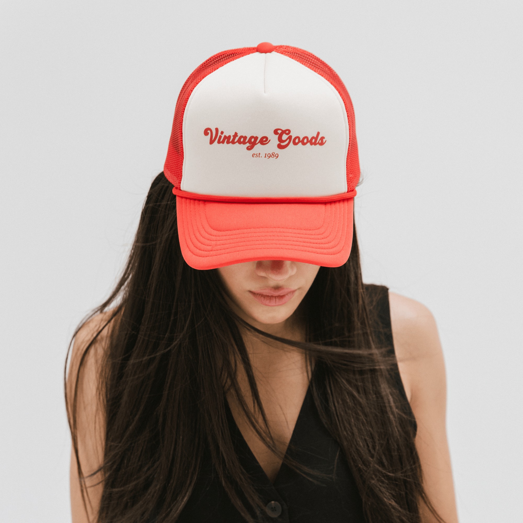 Gigi Pip trucker hats for women - Vintage Goods Foam Trucker Hat - 100% polyester foam + mesh trucker hat with a curved brim featuring the words "vintage goods" in a contrasting color as a design across the front panel [black]