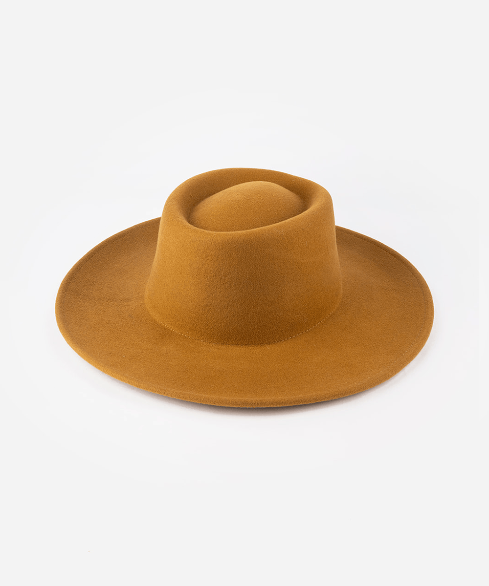 Gambler hat with an indented oval crown and an upturned brim against a white background #color_cinnamon