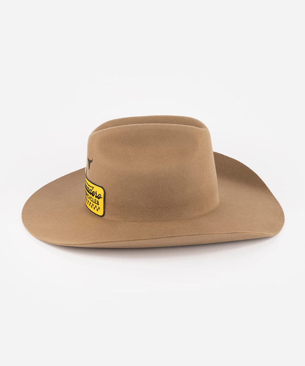 Brown cowboy hat with a logo on a white background #color_brown