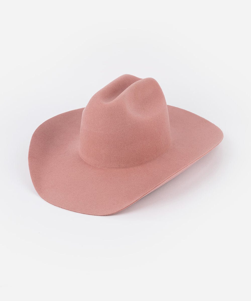 A rose colored cowboy hat with a wide brim and a true western cattleman crown. #color_rose