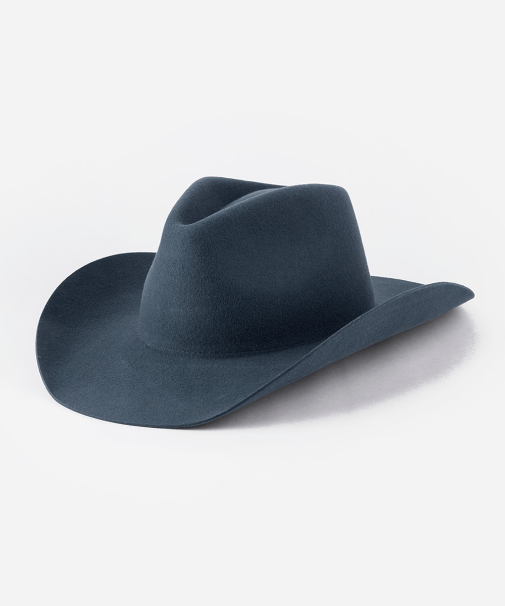 Blue cowboy hat against a white background #color_vintage blue