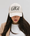 Gigi Pip trucker hats for women - Gigi Foam Trucker Hat - 100% polyester foam + mesh trucker hat with a curved brim featuring the word "Gigi" in a contrasting color as a design across the front panel [white]