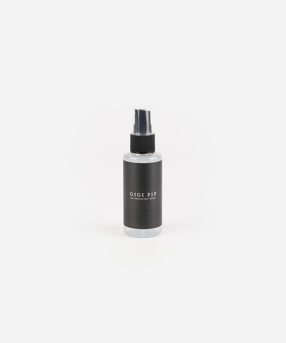 Black hat protectant spray bottle with 'GIGI PIP' branding on a white background