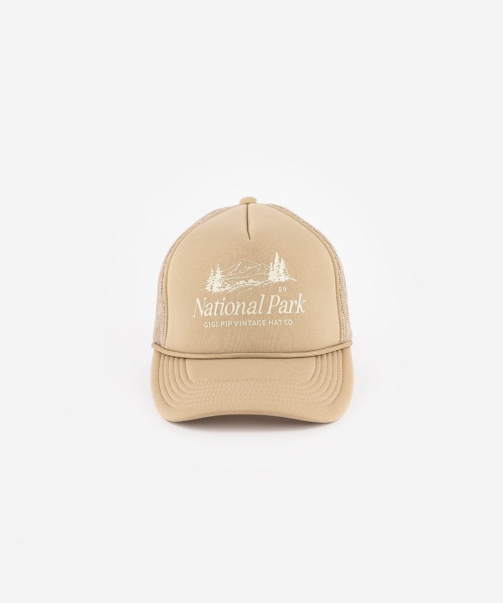 A tan trucker hat with 'National Park' logo on a white background #color_tan